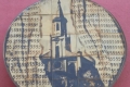 A nyíregyházi református templom egy kerámián Nyíregyházán  a Piros ház falán