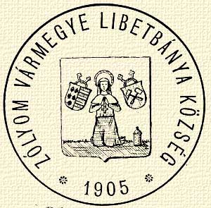 Libetbánya község címere Szent Kelemen pápával